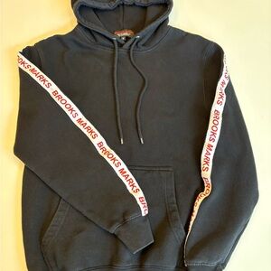 Brooks Marks Sweatsuit Set with keychains and fashion week accessories